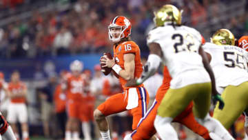ARLINGTON, TEXAS - DECEMBER 29: Trevor Lawrence #16 of the Clemson Tigers looks to pass in the first half against the Notre Dame Fighting Irish during the College Football Playoff Semifinal Goodyear Cotton Bowl Classic at AT&T Stadium on December 29, 2018 in Arlington, Texas. (Photo by Ronald Martinez/Getty Images)