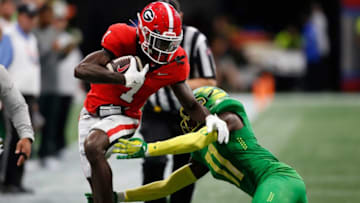 Georgia wide receiver Marcus Rosemy-Jacksaint avoids tackle fbetween Oregon and Georgia in Atlanta, on Saturday, Sept. 3, 2022.News Joshua L Jones