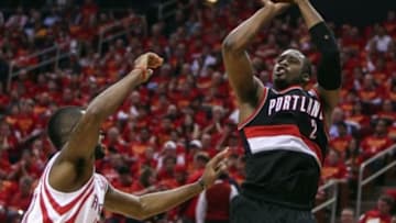 Apr 30, 2014; Houston, TX, USA; Portland Trail Blazers guard Wesley Matthews (2) shoots during the second quarter as Houston Rockets guard Troy Daniels (30) defends in game five of the first round of the 2014 NBA Playoffs at Toyota Center. Mandatory Credit: Troy Taormina-USA TODAY Sports