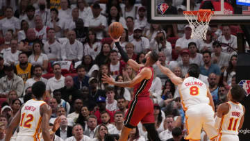 Miami Heat forward Caleb Martin (16) shoots the ball against Atlanta Hawks forward Danilo Gallinari (8)(Jasen Vinlove-USA TODAY Sports)