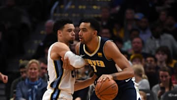 DENVER, CO - JANUARY 12: Memphis Grizzlies forward Dillon Brooks (24) guards Denver Nuggets forward Trey Lyles (7) during the third quarter on January 12, 2018 at Pepsi Center. (Photo by John Leyba/The Denver Post via Getty Images)