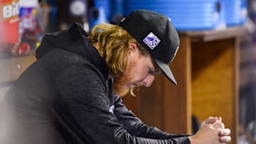 DENVER, CO - SEPTEMBER 7: Jon Gray #55 of the Colorado Rockies hangs his head in the dugout after pitching four innings against the Los Angeles Dodgers at Coors Field on September 7, 2018 in Denver, Colorado. (Photo by Dustin Bradford/Getty Images)