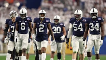 GLENDALE, AZ - DECEMBER 30: (L-R) Cam Brown