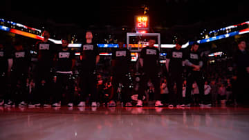SAN ANTONIO, TX - FEBRUARY 28: The San Antonio Spurs stand for the National Anthem before the game against the New Orleans Pelicans on February 28, 2018 at the AT