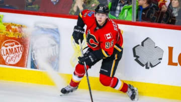 Jan 11, 2016; Calgary, Alberta, CAN; Calgary Flames center Sam Bennett (93) controls the puck against the San Jose Sharks during the third period at Scotiabank Saddledome. San Jose Sharks won 5-4. Mandatory Credit: Sergei Belski-USA TODAY Sports