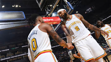 SAN FRANCISCO, CA - NOVEMBER 1: D'Angelo Russell #0 and Willie Cauley-Stein #2 of the Golden State Warriors hi-five during a game against the San Antonio Spurs on November 1, 2019 at Chase Center in San Francisco, California. NOTE TO USER: User expressly acknowledges and agrees that, by downloading and or using this photograph, user is consenting to the terms and conditions of Getty Images License Agreement. Mandatory Copyright Notice: Copyright 2019 NBAE (Photo by Noah Graham/NBAE via Getty Images)