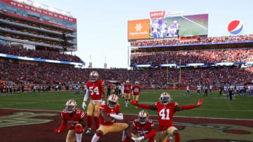SANTA CLARA, CALIFORNIA - JANUARY 11: Richard Sherman #25 of the San Francisco 49ers celebrates with teammates after intercepting a pass by Kirk Cousins #8 of the Minnesota Vikings in the third quarter of the NFC Divisional Round Playoff game at Levi's Stadium on January 11, 2020 in Santa Clara, California. (Photo by Ezra Shaw/Getty Images)