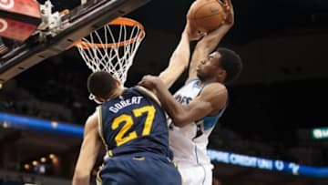 Mar 30, 2015; Minneapolis, MN, USA; Utah Jazz center Rudy Gobert (27) blocks Minnesota Timberwolves guard Andrew Wiggins (22) in the second quarter at Target Center. Mandatory Credit: Brad Rempel-USA TODAY Sports