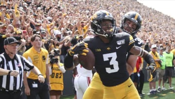 IOWA CITY, IOWA- SEPTEMBER 7: Wide receiver Tyrone Tracy #3 celebrates with tight end Nate Wieting #39 of the Iowa Hawkeyes after a touchdown during the second half against the Rutgers Scarlet Knights on September 7, 2019 at Kinnick Stadium in Iowa City, Iowa. (Photo by Matthew Holst/Getty Images)