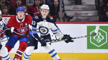 MONTREAL, QC - APRIL 03: Sami Niku #83 of the Winnipeg Jets skates as he looks towards the play against the Montreal Canadiens during the NHL game at the Bell Centre on April 3, 2018 in Montreal, Quebec, Canada. The Winnipeg Jets defeated the Montreal Canadiens 5-4 in overtime. (Photo by Minas Panagiotakis/Getty Images)