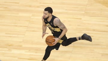 TORONTO, ON - JANUARY 26: Fred VanVleet #23 of the Toronto Raptors dribbles against the Utah Jazz at Air Canada Centre on January 26, 2018 in Toronto, Canada. NOTE TO USER: User expressly acknowledges and agrees that, by downloading and or using this photograph, User is consenting to the terms and conditions of the Getty Images License Agreement. (Photo by Tom Szczerbowski/Getty Images)