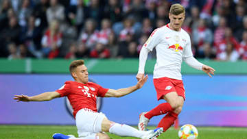 BERLIN, GERMANY - MAY 25: Joshua Kimmich of Bayern Munich challenges Timo Werner of RB Leipzig during the DFB Cup final between RB Leipzig and Bayern Muenchen at Olympiastadion on May 25, 2019 in Berlin, Germany. (Photo by Matthias Hangst/Bongarts/Getty Images)