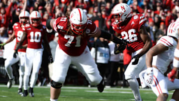 LINCOLN, NE - NOVEMBER 16: Running back Dedrick Mills #26 of the Nebraska Cornhuskers follows the block from offensive lineman Matt Farniok #71 to score against the Wisconsin Badgers at Memorial Stadium on November 16, 2019 in Lincoln, Nebraska. (Photo by Steven Branscombe/Getty Images)