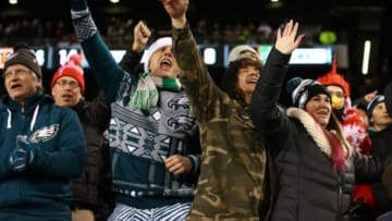 Dec 20, 2015; Philadelphia, PA, USA; Philadelphia Eagles fans celebrate a touchdown during the second quarter against the Arizona Cardinals at Lincoln Financial Field. Mandatory Credit: Jeffrey G. Pittenger-USA TODAY Sports