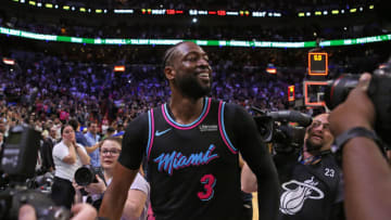 The Miami Heat's Dwyane Wade (3) celebrates after hitting a 3-pointer at the buzzer in the fourth quarter against the Golden State Warrios at AmericanAirlines Arena in Miami on Wednesday, Feb. 27, 2019. The Heat won, 126-125. (David Santiago/Miami Herald/TNS via Getty Images)