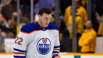 NASHVILLE, TN - DECEMBER 19: Tyson Barrie #22 of the Edmonton Oilers warms up before the game against the Nashville Predators at Bridgestone Arena on December 19, 2022 in Nashville, Tennessee. (Photo by Brett Carlsen/Getty Images)