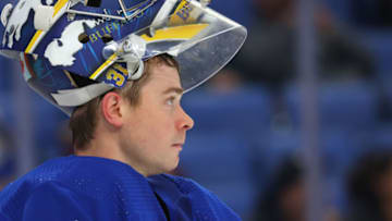 Jan 10, 2023; Buffalo, New York, USA; Buffalo Sabres goaltender Eric Comrie (31) during a stoppage in play against the Seattle Kraken during the third period at KeyBank Center. Mandatory Credit: Timothy T. Ludwig-USA TODAY Sports