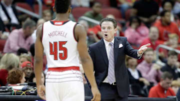 LOUISVILLE, KY - NOVEMBER 17: Rick Pitino the head coach of the Louisville Cardinals gives instructions to Donovan Mitchell #45 during the game against the Long Beach State 49ers at KFC YUM! Center on November 17, 2016 in Louisville, Kentucky. (Photo by Andy Lyons/Getty Images)