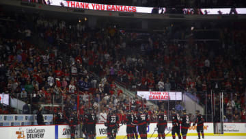RALEIGH, NORTH CAROLINA - JUNE 08: The Carolina Hurricanes exit the ice following Game Five of the Second Round of the 2021 Stanley Cup Playoffs against the Tampa Bay Lightning at PNC Arena on June 08, 2021 in Raleigh, North Carolina. (Photo by Jared C. Tilton/Getty Images)