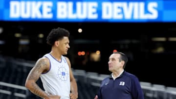 Duke basketball forward Paolo Banchero and Mike Krzyzewski (Photo by Tom Pennington/Getty Images)