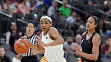 LAS VEGAS, NEVADA - APRIL 20: Zia Cooke #4 brings the ball up the court under pressure from Anaya Peoples #7 during the Jordan Brand Classic girls high school all-star basketball game at T-Mobile Arena on April 20, 2019 in Las Vegas, Nevada. (Photo by Ethan Miller/Getty Images)