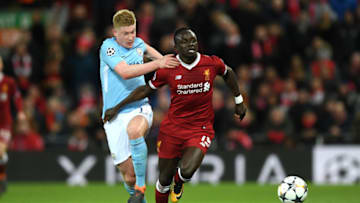 LIVERPOOL, ENGLAND - APRIL 04: Sadio Mane of Liverpool is challenged by Kevin De Bruyne of Manchester City during the UEFA Champions League Quarter Final Leg One match between Liverpool and Manchester City at Anfield on April 4, 2018 in Liverpool, England. (Photo by Shaun Botterill/Getty Images)