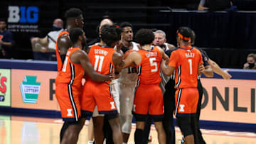 Dec 23, 2020; University Park, Pennsylvania, USA; Penn State Nittany Lions and Illinois Fighting Illini players get into a mid court confrontation during the second half at Bryce Jordan Center. Illinois defeated Penn State 98-81. Mandatory Credit: Matthew OHaren-USA TODAY Sports