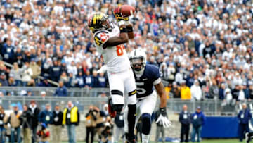 Nov 1, 2014; University Park, PA, USA; Maryland Terrapins wide receiver Amba Etta-Tawo (84) makes a catch in front of Penn State Nittany Lions cornerback Jordan Lucas (9) during the fourth quarter at Beaver Stadium. Maryland defeated Penn State 20-19. Mandatory Credit: Rich Barnes-USA TODAY Sports