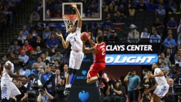 Dec 19, 2015; Brooklyn, NY, USA; Ohio State Buckeyes forward Marc Loving (2) looks to shoot over Kentucky Wildcats forward Skal Labissiere (1) during the second half at Barclays Center. Ohio State Buckeyes won 74-67. Mandatory Credit: Anthony Gruppuso-USA TODAY Sports