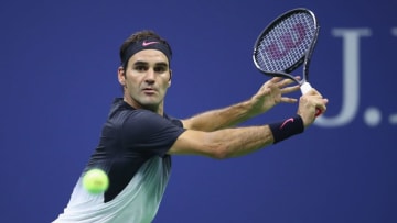 NEW YORK, NY - SEPTEMBER 06: Roger Federer of Switzerland returns a shot against Juan Martin del Potro of Argentina during their Men's Singles Quarterfinal match on Day Ten of the 2017 US Open at the USTA Billie Jean King National Tennis Center on September 6, 2017 in the Flushing neighborhood of the Queens borough of New York City. (Photo by Clive Brunskill/Getty Images)