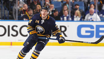 BUFFALO, NY - DECEMBER 4: Lawrence Pilut #24 of the Buffalo Sabres skates against the Toronto Maple Leafs during an NHL game on December 4, 2018 at KeyBank Center in Buffalo, New York. (Photo by Bill Wippert/NHLI via Getty Images)