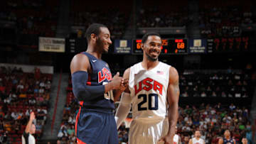 LAS VEGAS, NV - JULY 25: Mike Conley #20 of the USA White Team chats with John Wall #50 of against the USA Blue Team during 2013 USA Basketball Showcase at the Thomas & Mack Center at UNLV on July 25, 2013, in Las Vegas, Nevada. Copyright 2013 NBAE (Photo by Evan Gole/NBAE via Getty Images)