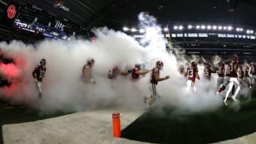 ARLINGTON, TX - DECEMBER 2: The Oklahoma Sooners take the field before playing the TCU Horned Frogs during the first half at AT