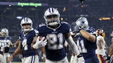 Nov 24, 2016; Arlington, TX, USA; Dallas Cowboys running back Ezekiel Elliott (21) scores a touchdown against the Washington Redskins during the second half at AT&T Stadium. The Cowboys defeat the Redskins 31-26. Mandatory Credit: Jerome Miron-USA TODAY Sports