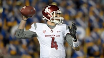 Nov 14, 2015; Pasadena, CA, USA; Washington State Cougars quarterback Luke Falk (4) throws a pass against the UCLA Bruins in a NCAA football game at Rose Bowl. Mandatory Credit: Kirby Lee-USA TODAY Sports