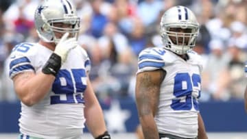 Dec 23, 2012; Arlington, TX, USA; Dallas Cowboys defensive tackle Sean Lissemore (95) and linebacker Anthony Spencer (93) look into the backfield of the New Orleans Saints at Cowboys Stadium. The Saints beat the Cowboys 34-31 in overtime. Mandatory Credit: Tim Heitman-USA TODAY Sports
