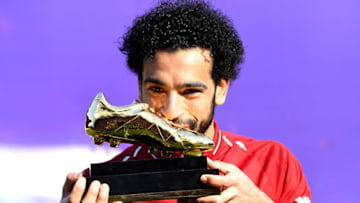 LIVERPOOL, ENGLAND - MAY 13: Mohamed Salah of Liverpool pose for a photo with his Premier League Golden Boot Award after the Premier League match between Liverpool and Brighton and Hove Albion at Anfield on May 13, 2018 in Liverpool, England. (Photo by Michael Regan/Getty Images)