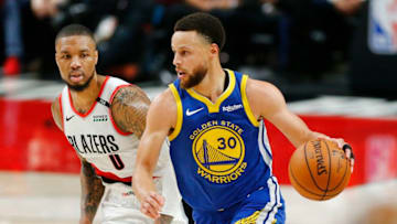 PORTLAND, OREGON - MAY 18: Stephen Curry #30 of the Golden State Warriors dribbles against Damian Lillard #0 of the Portland Trail Blazers during the second half in game three of the NBA Western Conference Finals at Moda Center on May 18, 2019 in Portland, Oregon. NOTE TO USER: User expressly acknowledges and agrees that, by downloading and or using this photograph, User is consenting to the terms and conditions of the Getty Images License Agreement. (Photo by Jonathan Ferrey/Getty Images)