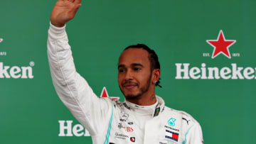 SAO PAULO, BRAZIL - NOVEMBER 17: Third placed Lewis Hamilton of Great Britain and Mercedes GP celebrates on the podium during the F1 Grand Prix of Brazil at Autodromo Jose Carlos Pace on November 17, 2019 in Sao Paulo, Brazil. (Photo by Mark Thompson/Getty Images)