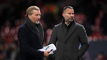 MANCHESTER, ENGLAND - NOVEMBER 27: Robbie Savage and Ryan Giggs look on prior to the UEFA Champions League Group H match between Manchester United and BSC Young Boys at Old Trafford on November 27, 2018 in Manchester, United Kingdom. (Photo by Laurence Griffiths/Getty Images)