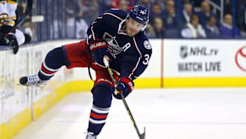 Oct 13, 2016; Columbus, OH, USA; Columbus Blue Jackets center Boone Jenner (38) clears the puck into the zone against the Boston Bruins in the second period at Nationwide Arena. Mandatory Credit: Aaron Doster-USA TODAY Sports