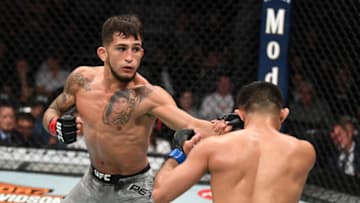 LAS VEGAS, NV - OCTOBER 06: Sergio Pettis lands a punch on Jussier Formiga of Brazil in their flyweight bout during the UFC 229 event inside T-Mobile Arena on October 6, 2018 in Las Vegas, Nevada. (Photo by Josh Hedges/Zuffa LLC/Zuffa LLC)