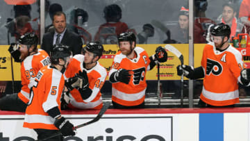 PHILADELPHIA, PA - DECEMBER 19: Philippe Myers #5 of the Philadelphia Flyers celebrates a first period goal with teammates Jakub Voracek #93, Morgan Frost #48, Claude Giroux #28 and Sean Couturier #14 the Buffalo Sabres on December 19, 2019 at the Wells Fargo Center in Philadelphia, Pennsylvania. (Photo by Len Redkoles/NHLI via Getty Images)