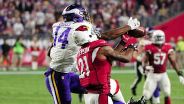Dec 10, 2015; Glendale, AZ, USA; Arizona Cardinals cornerback Patrick Peterson (21) breaks up a pass intended for Minnesota Vikings wide receiver Stefon Diggs (14) during the second half at University of Phoenix Stadium. Mandatory Credit: Matt Kartozian-USA TODAY Sports
