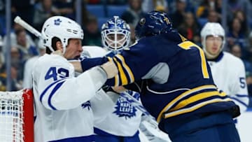 Sep 30, 2016; Buffalo, NY, USA; Toronto Maple Leafs left wing Rich Klune (49) and Buffalo Sabres center Jean Dupuy (72) fight during the game at KeyBank Center. Mandatory Credit: Kevin Hoffman-USA TODAY Sports