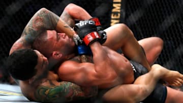 LAS VEGAS, NEVADA - JANUARY 18: Carlos Diego Ferreira (L) wrestles with Anthony Pettis in a lightweight bout during UFC 246 at T-Mobile Arena on January 18, 2020 in Las Vegas, Nevada. Ferreira won by submission in the second round. (Photo by Steve Marcus/Getty Images)