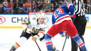 NEW YORK, NY - DECEMBER 16: Paul Stastny #26 of the Vegas Golden Knights takes a face off against Kevin Hayes #13 of the New York Rangers at Madison Square Garden on December 16, 2018 in New York City. The Vegas Golden Knights won 4-3 in overtime. (Photo by Jared Silber/NHLI via Getty Images)