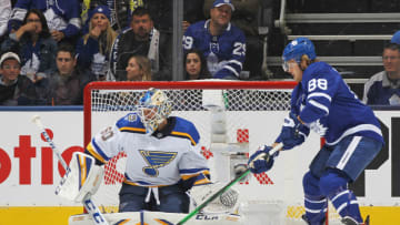 TORONTO, ON - OCTOBER 7: William Nylander #88 of the Toronto Maple Leafs looks to tip a puck at Jordan Binnington #50 of the St. Louis Blues during an NHL game at Scotiabank Arena on October 7, 2019 in Toronto, Ontario, Canada. The Blues defeated the Maple Leafs 3-2. (Photo by Claus Andersen/Getty Images)