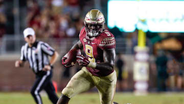 TALLAHASSEE, FL - SEPTEMBER 8: Runningback Jacques Patrick #9 of the Florida State Seminoles on a running play during the game against the Samford Bulldogs at Doak Campbell Stadium on Bobby Bowden Field on September 8, 2018 in Tallahassee, Florida. The Seminoles defeated the Bulldogs 36 to 26. (Photo by Don Juan Moore/Getty Images)