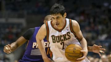 Jan 29, 2014; Milwaukee, WI, USA; Milwaukee Bucks forward Ersan Ilyasova (7) drives for the basket during the fourth quarter against the Phoenix Suns at BMO Harris Bradley Center. Phoenix won 126-117. Mandatory Credit: Jeff Hanisch-USA TODAY Sports